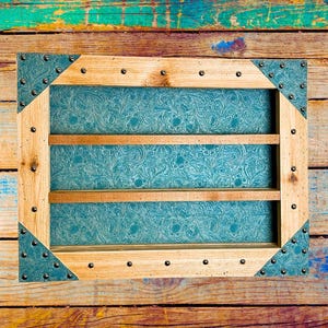 Belt Buckle Display Case - Tooled Faux Leather Background