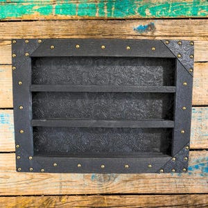Belt Buckle Display Case - Tooled Faux Leather Background