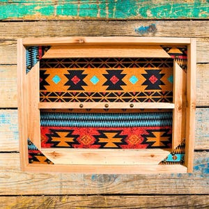 Belt Buckle Display Case - Southwest Design Background