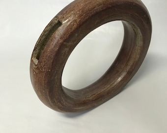 Vertical ring shaped flower vase