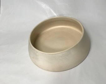Light colored low flower vase