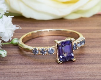 Sustainable Ring in 750 Eco Gold with natural gemstones: Dark purple Spinel paired with Salt and Pepper Diamonds. Handmade in Bali!