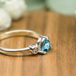 Handmade ring in sterling silver with sky blue Topaz and round Salt and Pepper Diamonds as ethical sourced gemstones for engagement ring image 3