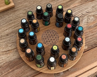 Round oil storage stand with Flower of Life (laser-engraved) for 24 x 15ml bottles, e.g., for doTERRA oils. Made of oak wood.