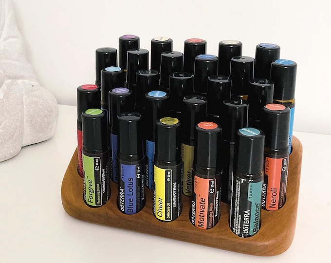 Beautiful, unique cherry wood display stand for 27 oil roll-ons (10ml), suitable for e.g., doTERRA essential oils, with knot inclusions.