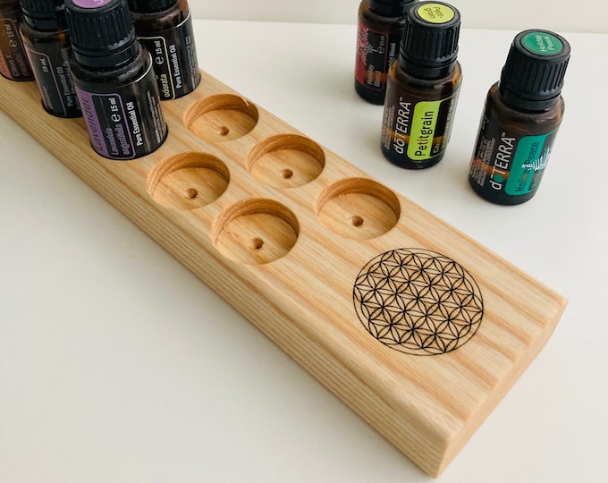 Ash wood stand for 10 oil bottles of 15ml essential oils and engraved "Flower of Life"