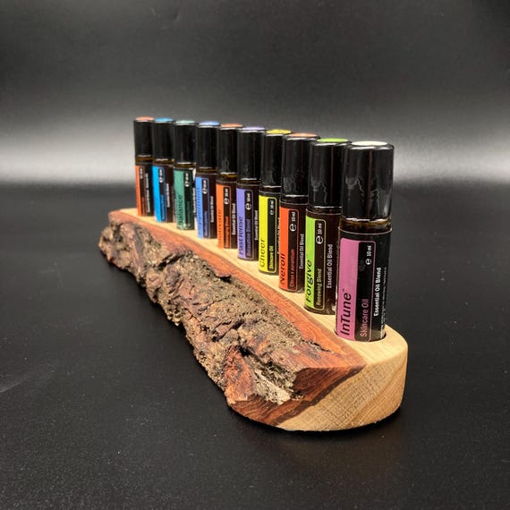 Beautifully curved, unique piece made of oak wood with bark, for 10 oil roll-ons (10ml), suitable for e.g. doTERRA essential oils.