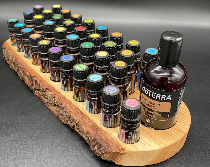 Unique piece with natural edge made of oak wood for doTERRA oils. Wooden holder for 24 oil bottles of 15ml each, 11 x 5ml essential oils and FCO.