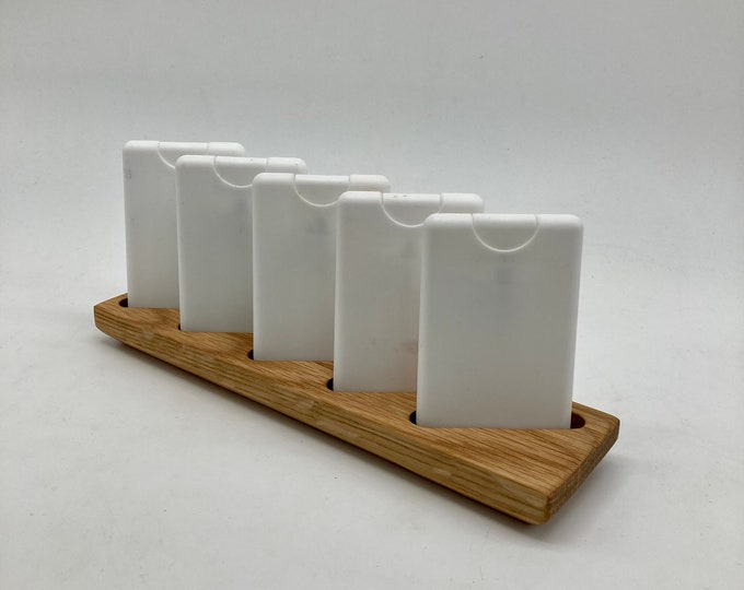 Custom-made display for storage for e.g. dietary supplement sprays made of oak wood