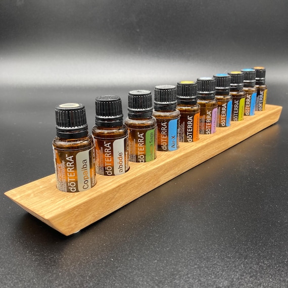 Oil dispenser with "Swiss edge" for e.g. 10 doTERRA oils of 15ml each / Storage for essential oils