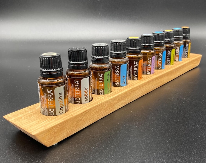 Oil dispenser with "Swiss edge" for e.g. 10 doTERRA oils of 15ml each / Storage for essential oils