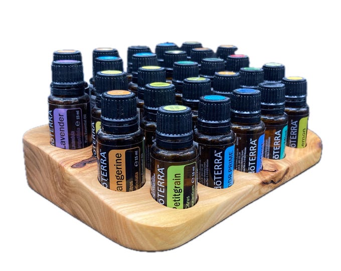 A unique display stand for e.g. doTERRA oils, wooden holder for 27 oil bottles of 15ml essential oils.