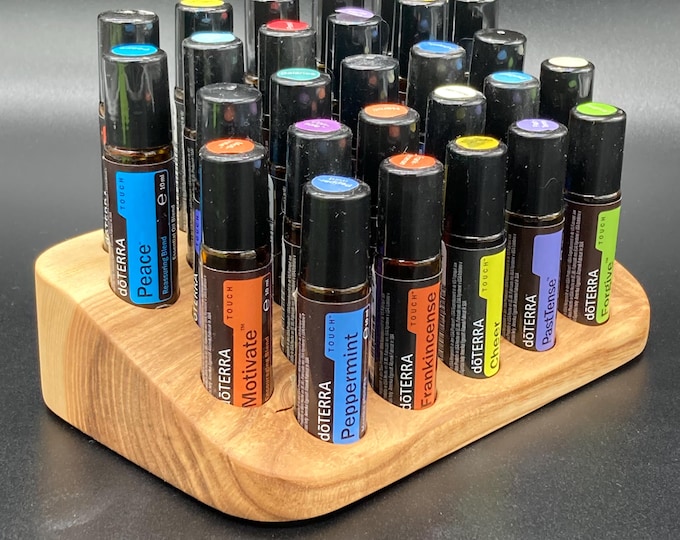 Beautiful, unique ash wood display stand for 27 oil roll-ons (10ml), suitable for e.g., doTERRA essential oils, with knot inclusions.