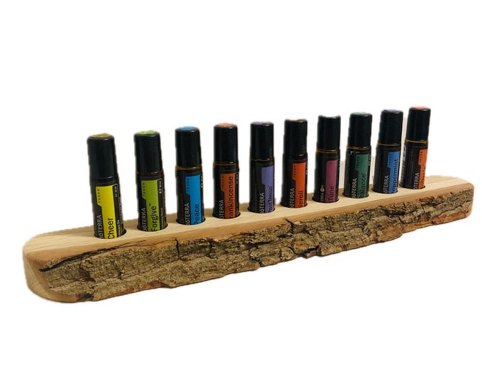Beautifully curved, unique piece made of untreated oak wood for 10 oil roll-ons (10ml), suitable for e.g., doTERRA essential oils.