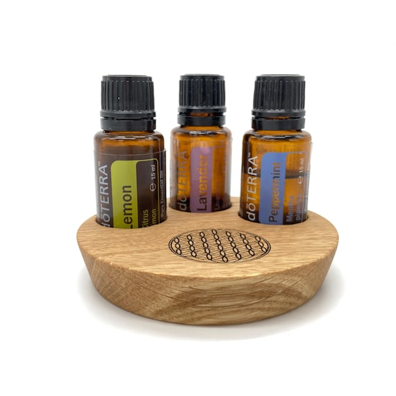 The 3-piece starter model with Flower of Life made of oak wood oil organizer stand for e.g. doTERRA oils, or other essential oils.