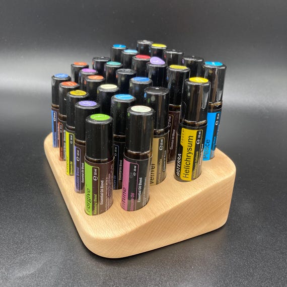 Beautiful beechwood holder for 27 oil roll-ons (10ml), suitable for e.g. doTERRA essential oils.