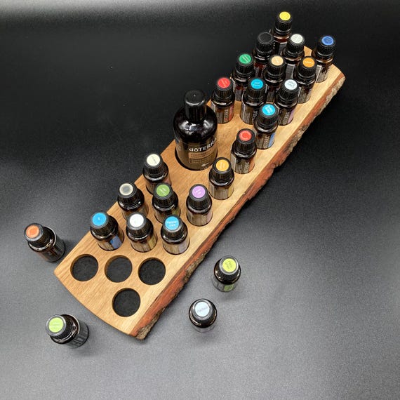 Unique piece with natural edge made of oak wood for doTERRA oils. Wooden holder for 24 oil bottles of 15ml essential oils + FCO.
