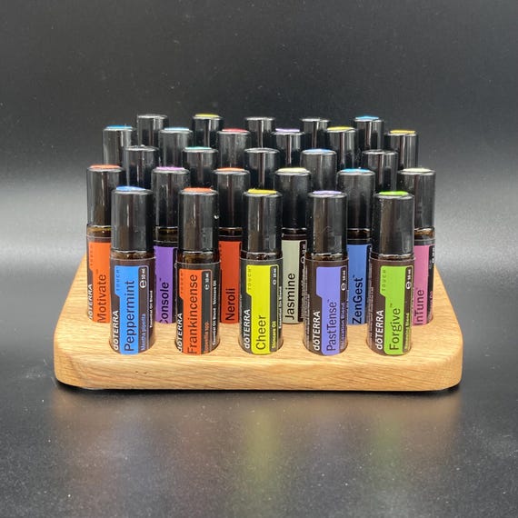 Beautiful oak wood holder for 27 oil roll-ons (10ml), suitable for e.g. doTERRA essential oils.