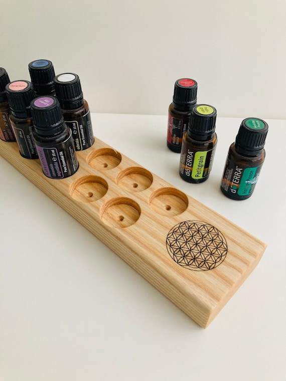 Ash wood stand for 10 oil bottles of 15ml essential oils and engraved "Flower of Life"