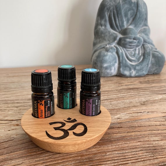 The ultimate stand for all yoga enthusiasts. Holds three 5ml bottles and features an engraved Om symbol, crafted from genuine oak wood.