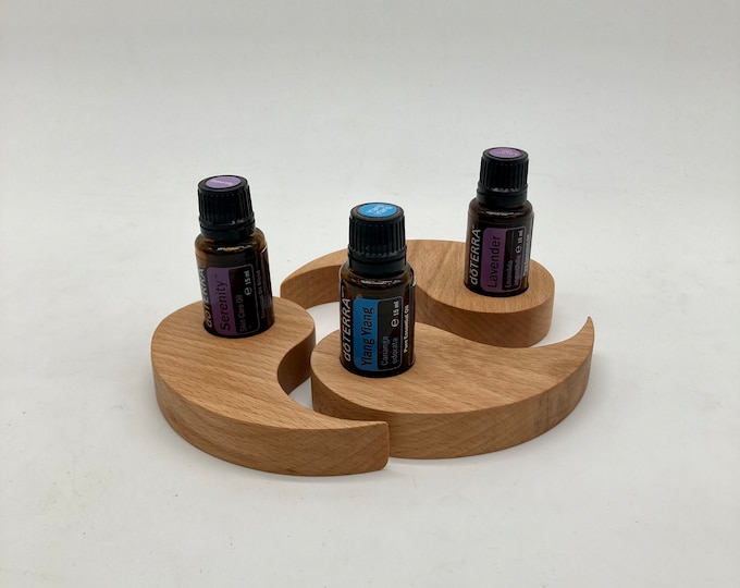 A three-part display for essential oils based on YINYANG, or just nice to look at.