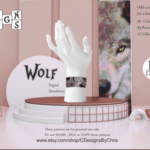 May include: A digital simulation of a wolf beading pattern for a bracelet. The pattern is for odd count peyote stitch and uses 17 colors. The pattern is 30 columns wide and 93 rows long. The image includes the text "PDF Download".