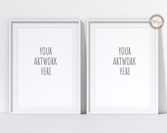 May include: Two white picture frames with a white mat and a white background. The text "YOUR ARTWORK HERE" is printed in black inside each frame.