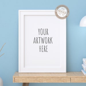 A2, A1 Portrait White Frame Mockup, Thin Digital Styled Frame on a Wooden Office Desk, Blue Wall, Stock Photography Mock Up, PSD + PNG + JPG