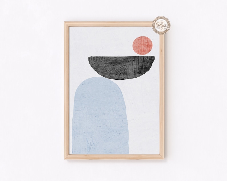May include: Abstract art print with a blue, black, and red geometric design. The print is framed in a light wood frame.