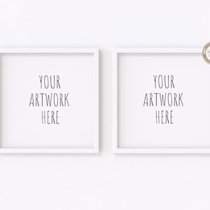 May include: Two white picture frames with the text "YOUR ARTWORK HERE" in each frame, hanging on a white wall.