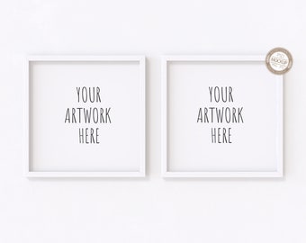 May include: Two white picture frames with the text "YOUR ARTWORK HERE" in each frame, hanging on a white wall.