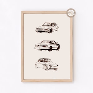 May include: A framed print of three vintage cars drawn in black and white ink. The cars are a Volvo, a BMW, and a Fiat.