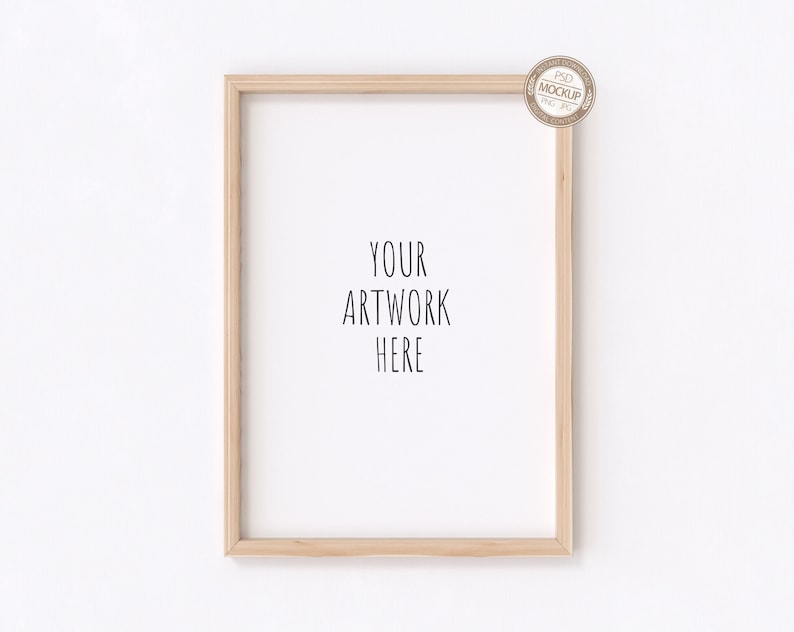 May include: A simple wooden frame with a white background and the text "YOUR ARTWORK HERE" in black.