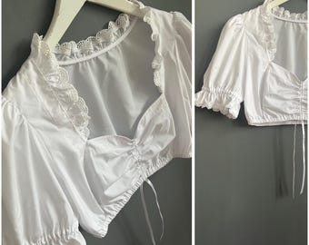 Blusa vintage de algodón y poliéster con ojales y lazo en la parte delantera para mujer, estilo dirndl, manga corta, con volantes y lazo, talla L