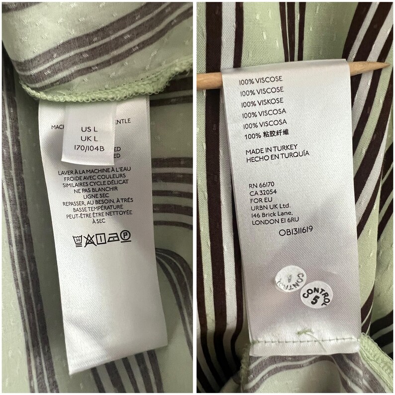 May include: A green and brown striped shirt with a white care label. The label includes the text "100% Viscose", "Made in Turkey", "RN 66170", "CA 32054", "For EU", "URBN UK Ltd.", "146 Brick Lane", "London E1 6RU", and "OB1311619".