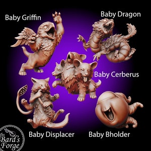 May include: Five miniature fantasy creatures, painted in a brown color, are arranged on a purple background. The creatures are a baby griffin, a baby dragon, a baby cerberus, a baby displacer, and a baby beholder. The text "The Bard's Forge" is in the lower left corner of the image.