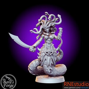 May include: A gray 3D printed miniature of a female figure with snakes for hair, holding a sword and standing on a round base. The figure is wearing a detailed, armored outfit with a skirt and a snake-like tail.