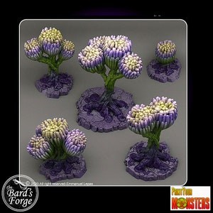May include: Five 3D printed miniature alien plants with purple and green stems and yellow and purple flowers. The plants are on a purple and grey textured base.