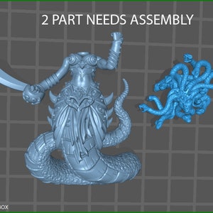 May include: Two-part 3D printed model of a female figure with a snake tail and multiple snake heads. The figure is holding a sword in one hand and has a snake head on her head. The model is blue and gray and is ready to be assembled.