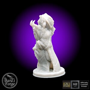 May include: A white 3D printed miniature of a creature with a long, pointed snout and claws. The creature is wearing a cloak and is standing on a round base. The miniature is from Hero's Hoard, an officially licensed 3D printer.
