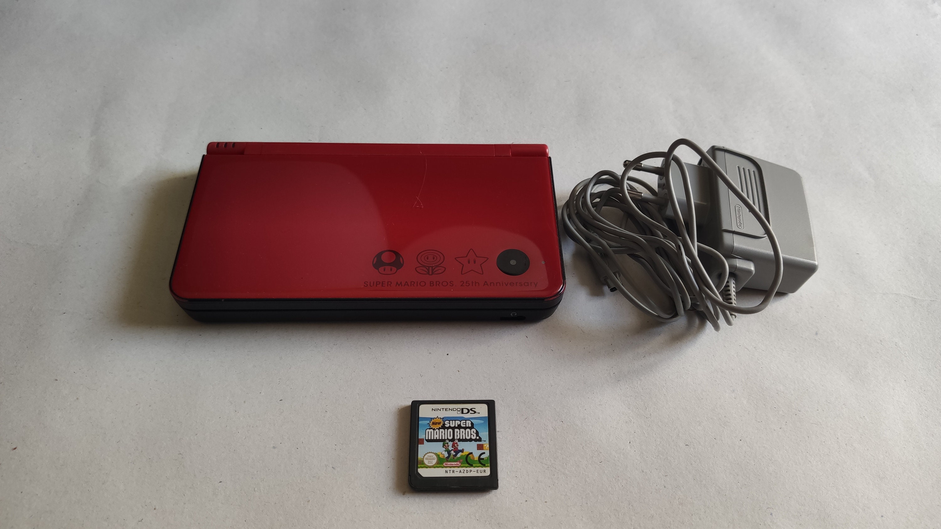 Nintendo DSi XL 25th Anniversary Edition with Mario Kart DS Game Red  Handheld