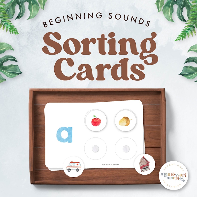 May include: A printable set of beginning sounds sorting cards featuring the letter "a" with images of an apple and an acorn. The cards are designed for use with Montessori marbles.