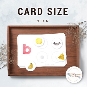 May include: A printable Montessori card featuring the letter "b" in pink, along with various images to match, including a banana, a button, a bat, and a bell. The card measures 4 inches by 6 inches.