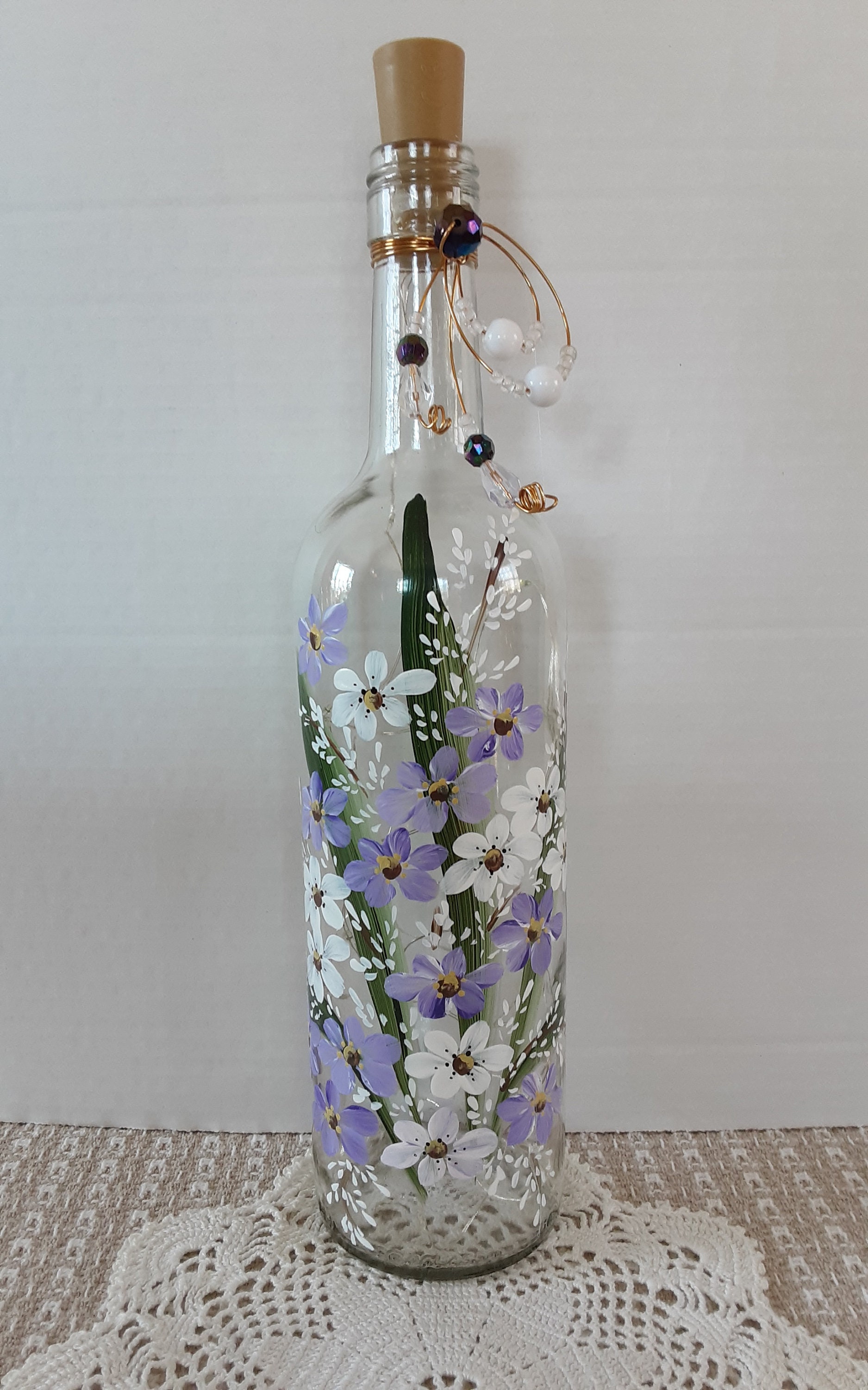 Hand-Painted Purple Flowers Water Bottle!  Wine bottle crafts, Bottle  painting, Unique items products