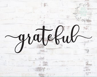 May include: A black and white digital design file for a cursive word art design that says "grateful".
