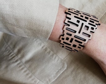 COBOGO Laser cut openwork leather bracelet for women with magnetic clasp Fifties Design