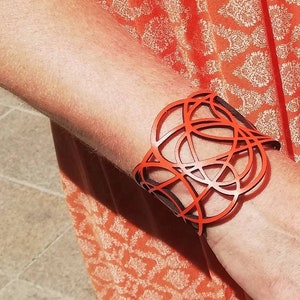 Women's laser cut Leather Bracelet with graceful intertwined lines, ajustable, elegant easy to use magnetic clasp 5 orange