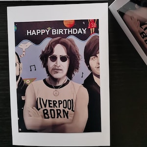 Tarjeta de feliz cumpleaños de John Lennon, The Beatles, Lennon, paz, leyenda. Incluye sobre y bolsa de plástico. Tarjeta de John Lennon