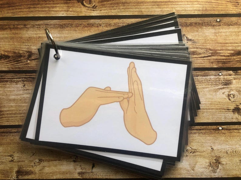 May include: A black and white illustration of two hands forming the British Sign Language sign for the letter "H".