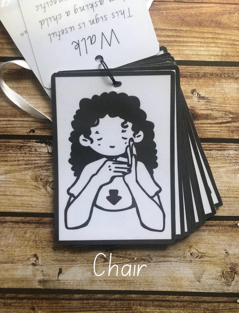 May include: Black and white illustration of a person signing the word "chair" in American Sign Language. The word "Chair" is written below the illustration.